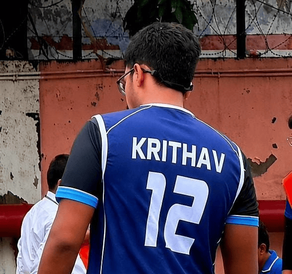 Local Kolkata football players gathered on a community ground, capturing the spirit of grassroots football in the city.